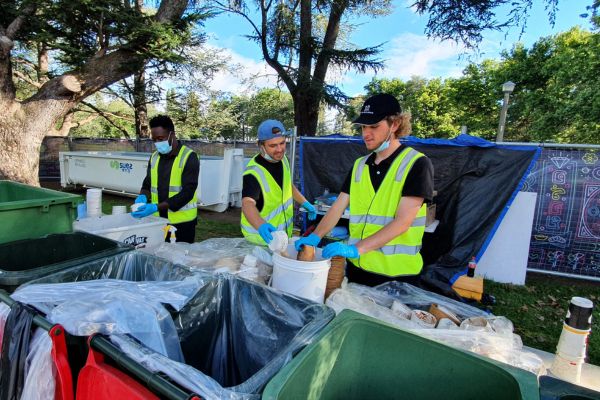Staff handling waste