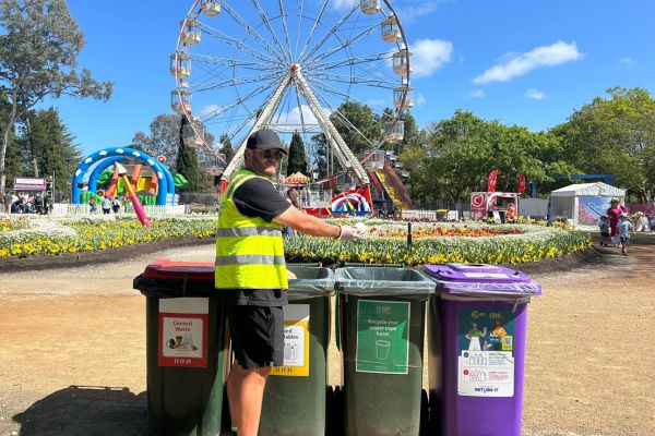 Man with 4 different bins